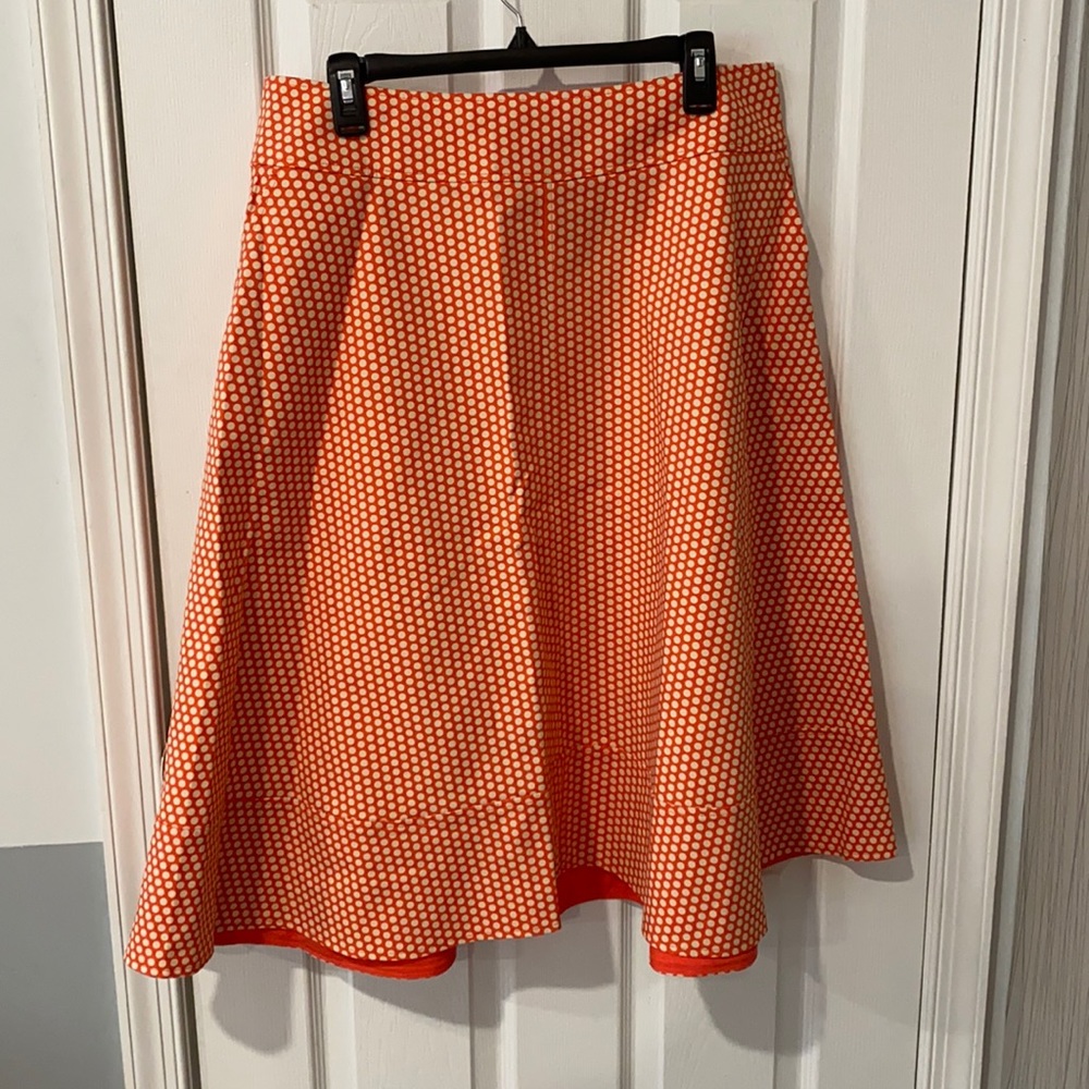 Orange polka dot skirt—never worn